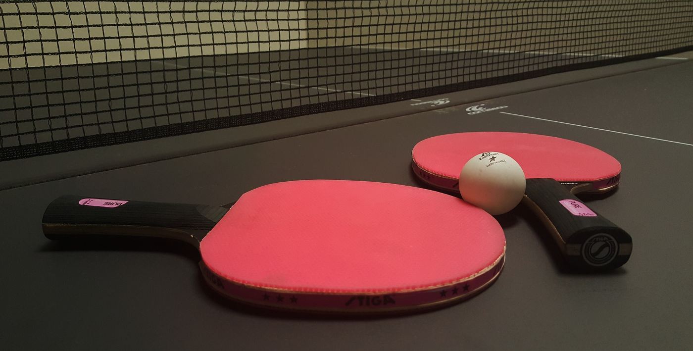 Ping-pong ball, net and paddles - 15 Fun Activities for Youth Groups Indoors