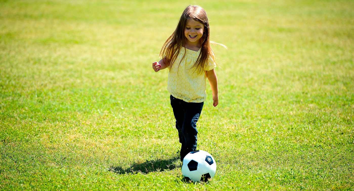 Young girl playing soccer - Sports for Toddlers: Which Sport Is Best for Your Child?