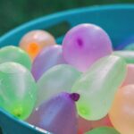 Bucket of water balloons - 18 entertaining activities to do for kids